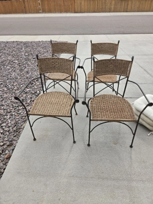 Wrought iron heavy metal frame chairs with woven resin